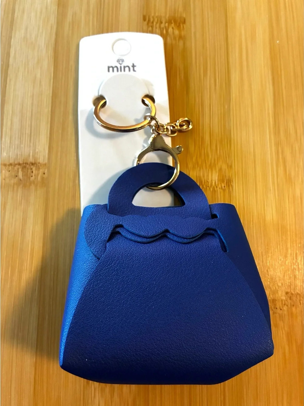 Mint Navy mini handbag keychain with gold hardware